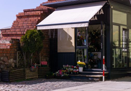 Tiny flower shop in the historic center of the Warshaw city, Poland