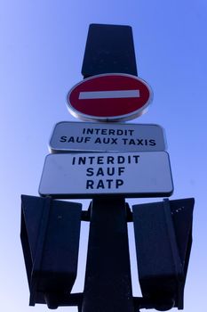 Road sign No entry except taxis against the sky in Paris, France