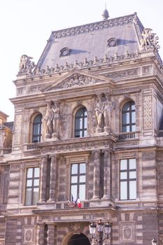 Ancient facade of the Louvre in Paris, France