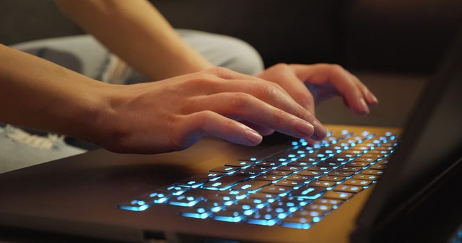 Woman Writes Message to Social Network. Hands typing on Keyboard Late Night Working. Journalist Writes Article in Media. Working on Laptop. Modern Business.