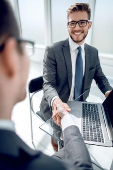 close up.handshake business people in the Bank office.business concept