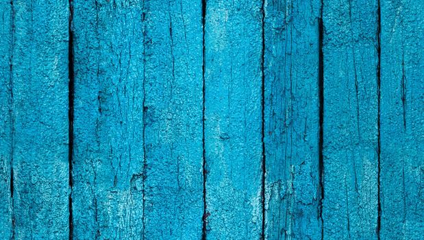 Seamless blue painted old wooden vertical boards texture