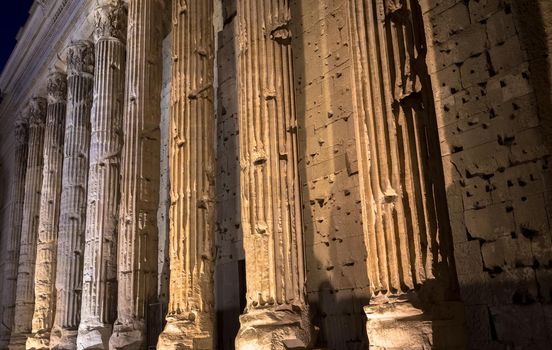 Rome, Italy. Detail of illuminated column architecture of Pantheon by night. Useful as archaeology background.