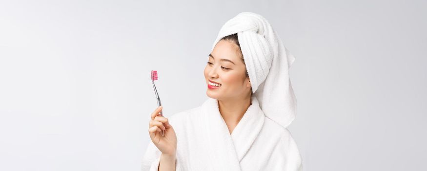 Close up of Smile woman brush teeth. great for health dental care concept, Isolated over white background. asian