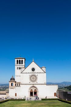 Assisi village in Umbria region, Italy - circa June 2021: the most important Italian St. Francis Basilica (Basilica di San Francesco)