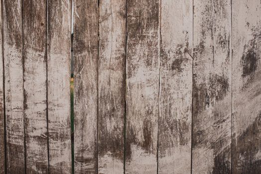 Old boards are completely dirty in white shabby paint.