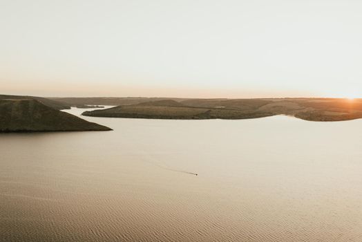 Islands in middle of the sea at sunset