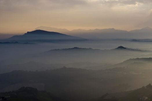 The valleys near Ripatransone are covered in mist in the morning