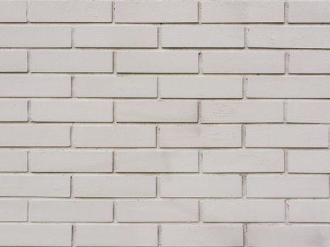 Grunge white brick backdrop.