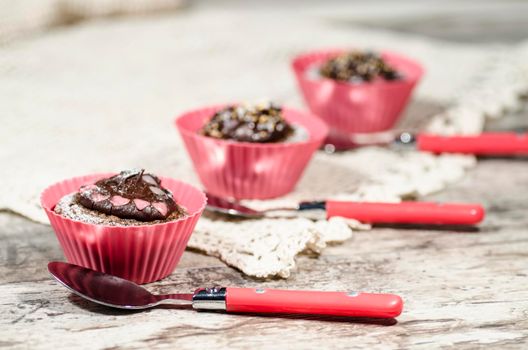 Diet chocolate cupcakes on a plate decorated with chocolate. From the series "Recipes for diet Ducane"