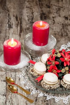 Christmas decoration with candles, cookies and ribbons, blurred background. From series Christmas and New Year