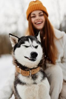 woman with dog winter landscape walk friendship fresh air. High quality photo