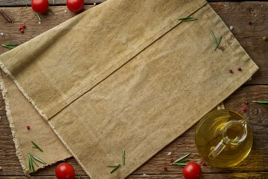 Menu, recipe, mock up, banner. Food seasoning background. Old linen napkin, spices, herbs on a old rustic backdrop. Top view, copy space.