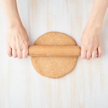 Step by step recipe. Homemade galette with vegetable. Top view, white wooden table, raw dough