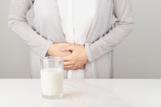 Lactose intolerance, health problem with dairy food products concept
