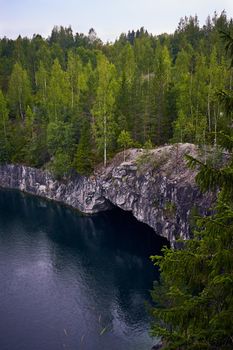 marble quarry, canyon, harsh Northern nature, vertical