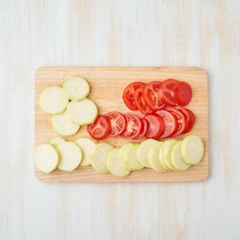 Step by step recipe. Homemade galette with vegetable. Top view, white wooden table