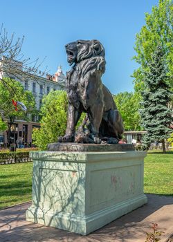 Odessa, Ukraine 06.05.2022. Sculpture Lion in the City garden in Odessa during the war in Ukraine on a sunny spring day