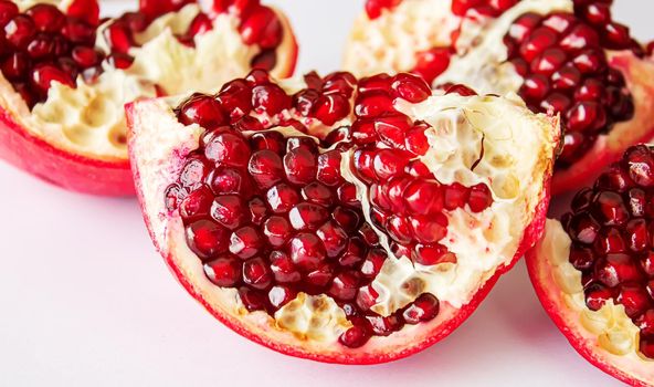 pomegranate on white background. selective focus.food