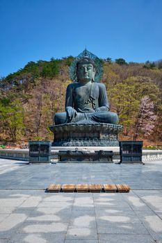 The Great Unification Buddha Tongil Daebul is a 14.6-meter 108 ton Bronze Buddha statue in Seoraksan National Park, South Korea.