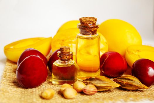 apricot and cherry oil in a small jar. selective focus.nature