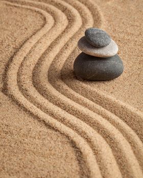 Japanese Zen stone garden - relaxation, meditation, simplicity and balance concept - pebbles and raked sand tranquil calm scene