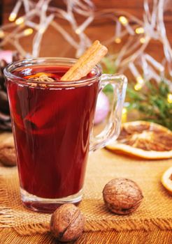 Christmas mulled wine. Merry Christmas. Glass of mulled wine with cinnamon and anise, top view. Selective focus.Holiday