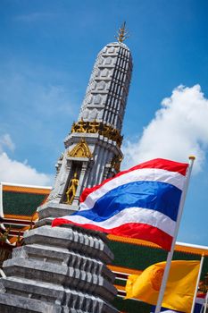 Thailand flag and Buddhist temple Wat Pho. Bangkok, Thailand