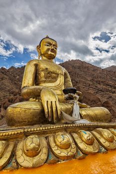 Sakyamuni Buddha statue near Hemis gompa (Tibetan Buddhist monastery). Hemis, Ladakh, India