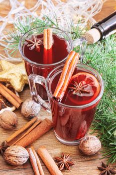 Christmas mulled wine. Merry Christmas. Glass of mulled wine with cinnamon and anise, top view. Selective focus.Holiday