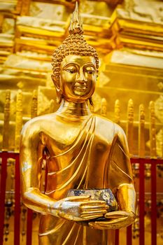 Gold Buddha statue in Wat Phra That Doi Suthep, Chiang Mai, Thailand