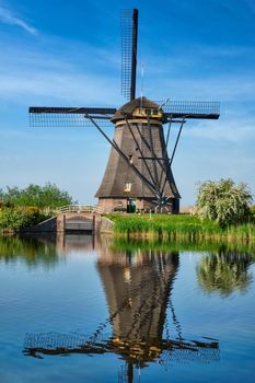 Netherlands rural lanscape with windmills at famous tourist site Kinderdijk in Holland