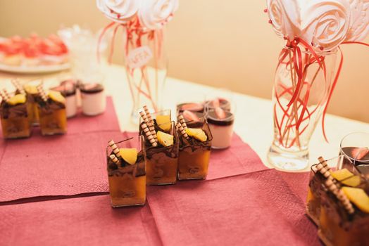 Table with food for the holiday. Cuisine. Culinary Buffet. Dinner Catering. Dining Food. Celebration Party. Concept wedding birthday. Sweet pastries desserts