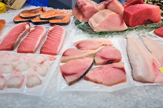 Salmon and tuna fillet for sale at a fish market