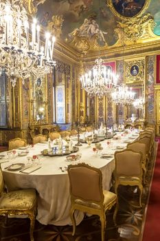 VENARIA REALE, ITALY - CIRCA AUGUST 2020: luxury dining room in Baroque style  with gala dinner table setting