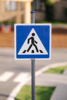 Traffic signs on the playground in the mini city for children. Toy city.