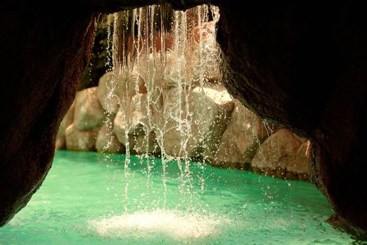 waterfall. view from cave waterfall. summer holiday