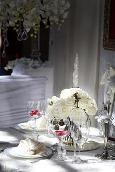 Professional restaurant serving with glasses and plates