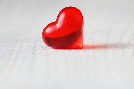 red hearts on wooden background