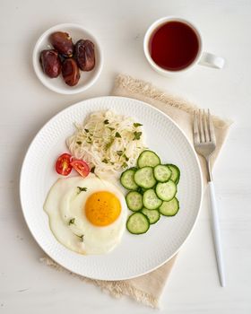 gluten free breakfast - omelet with cherries and cucumber, dash fodmap diet, healthy balanced food