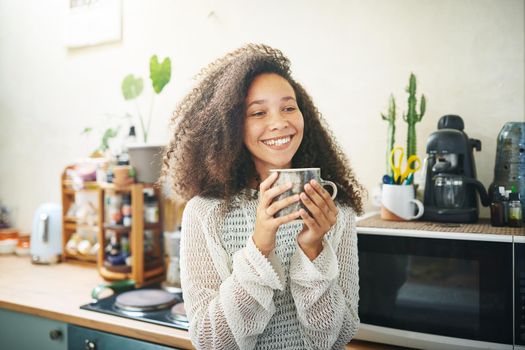 Portrait of a beautiful girl enjoying coffee and social media