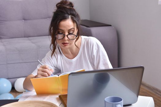 Working from home. beautiful young woman working using laptop while sitting in home office