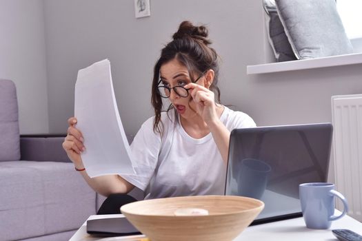 Working from home. beautiful young woman working using laptop while sitting in home office