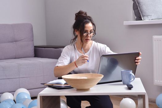 Working from home. beautiful young woman working using laptop while sitting in home office