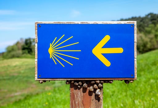 Road sign of Camino de Santiago, pilgrimage route to the Cathedral of Santiago de Compostela