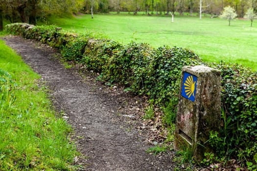 Road sign of Camino de Santiago, pilgrimage route to the Cathedral of Santiago de Compostela