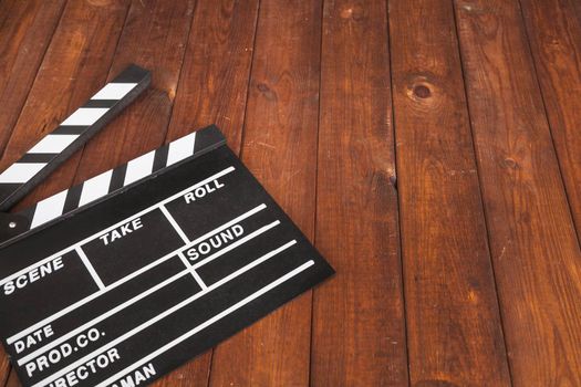 clapperboard wooden background