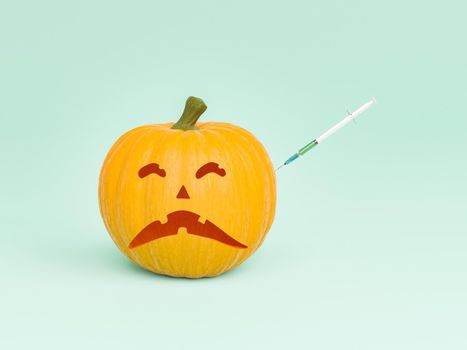 halloween pumpkin with scary face and a syringe in it. concept of COVID vaccination, halloween and autumn. 3d render