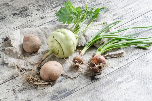 Fresh vegetables on old wooden table. From the series "Autumn vegetables"