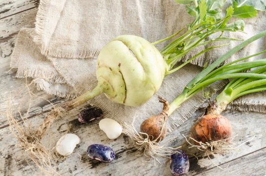 Fresh vegetables on old wooden table. From the series "Autumn vegetables"